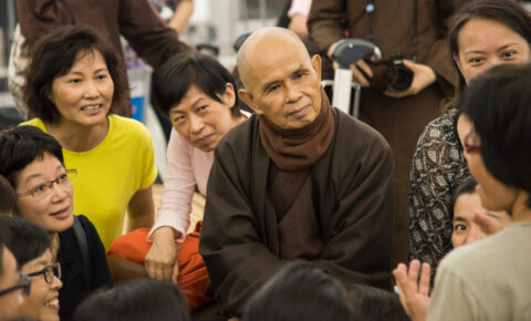 Thich Nhat Hanh listening to his students in Hong Kong, 2013.