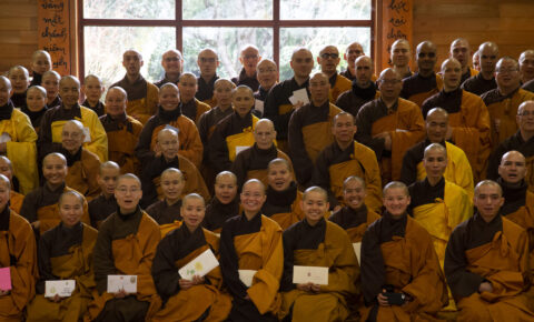 The whole sangha taking photos together